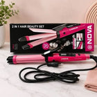 Pink and black NOVA 2-in-1 hair beauty set with a curling iron and its retail box on a light marble surface, styled with a small plant and folded towel.