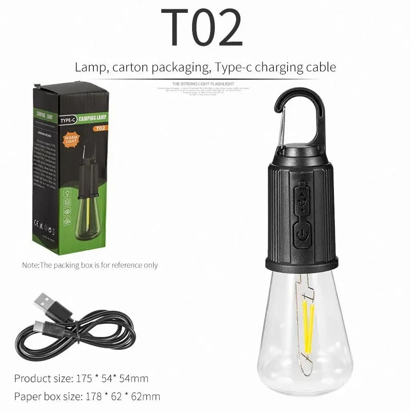 Black camping light with packaging and charging cable on a white background