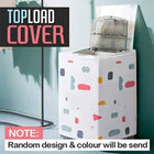 A white top-load washing machine cover with a colorful abstract pattern of pink, blue, yellow, and gray shapes, shown installed on a washing machine with its lid open. Text overlays read 'TOPLOAD COVER' and 'NOTE: Random design & colour will be send'.